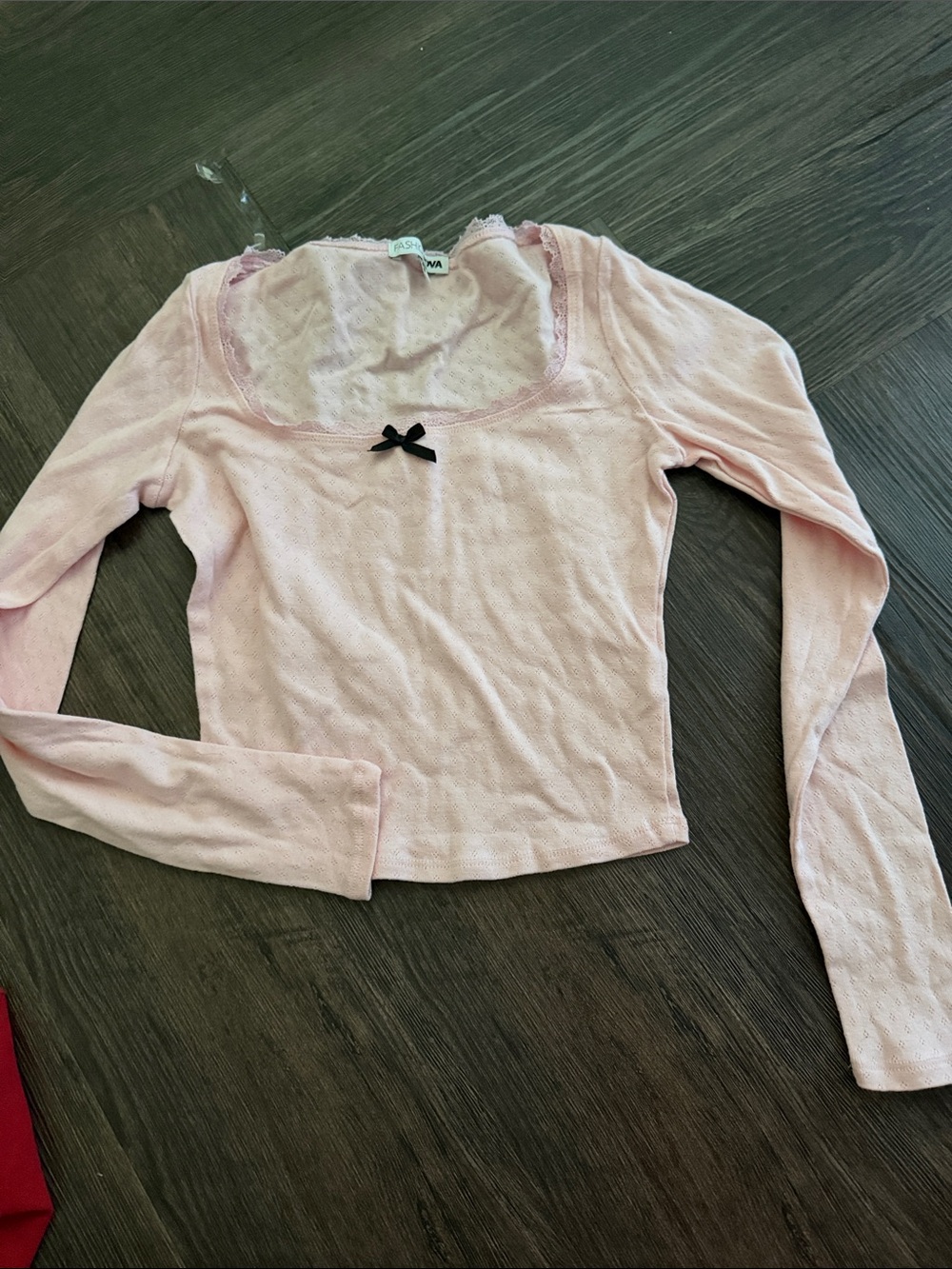 Fashion Nova Light Pink Long Sleeve Scoop Neck Top with Black Bow